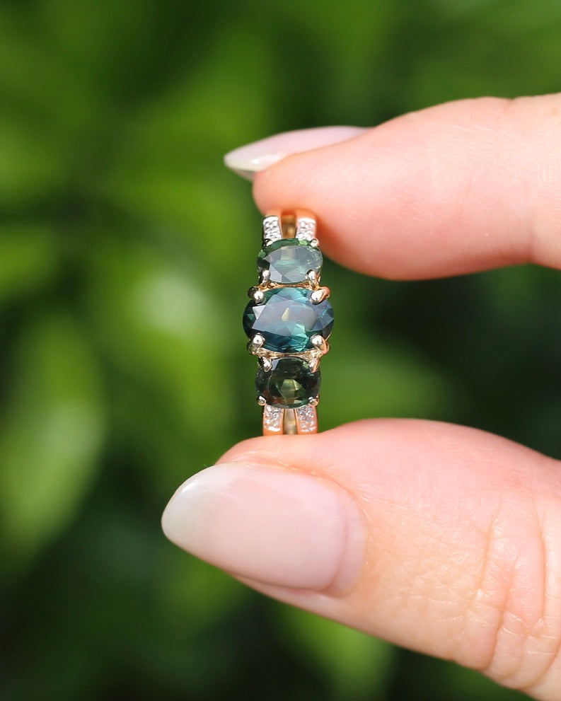 2.49ct Australian Green and Parti Sapphire Trilogy with diamond side stones, 10ct Yellow Gold, size 7 or just over N1/2, 3.38g