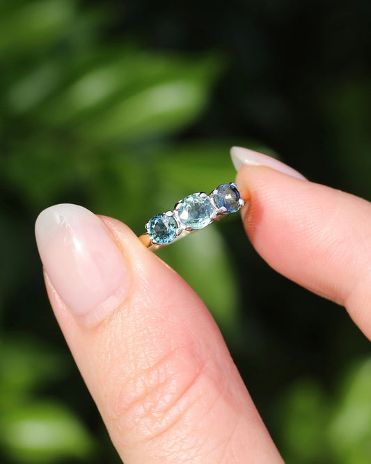 Vintage 1.28ct Blue Parti Sapphire Trilogy, 9ct Yellow and White Gold, size O or 7.25, 1.73g