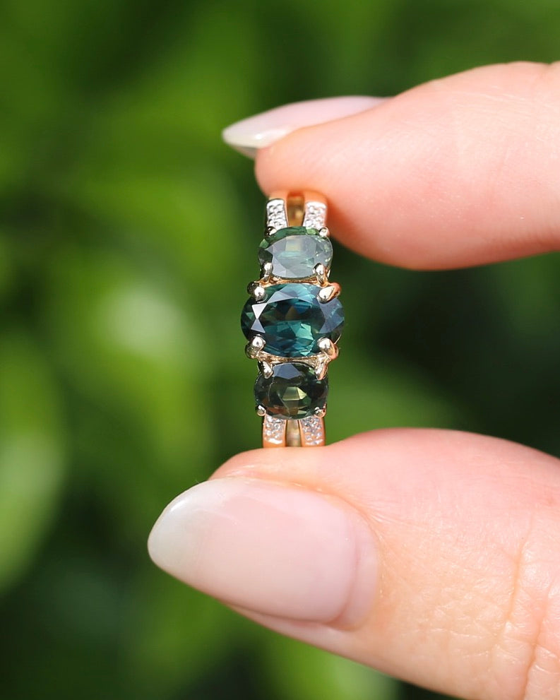 2.49ct Australian Green and Parti Sapphire Trilogy with diamond side stones, 10ct Yellow Gold, size 7 or just over N1/2, 3.38g
