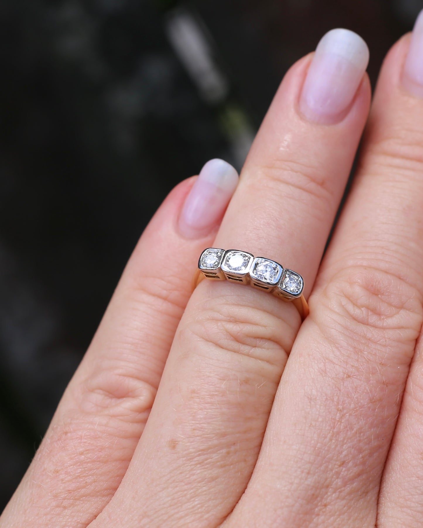 Circa 1930s Four Stone "Quadrillo" Diamond Ring, 18ct Yellow Gold and Paladium, size just over K1/2 or just over 5.5, 3.04g, with valuation