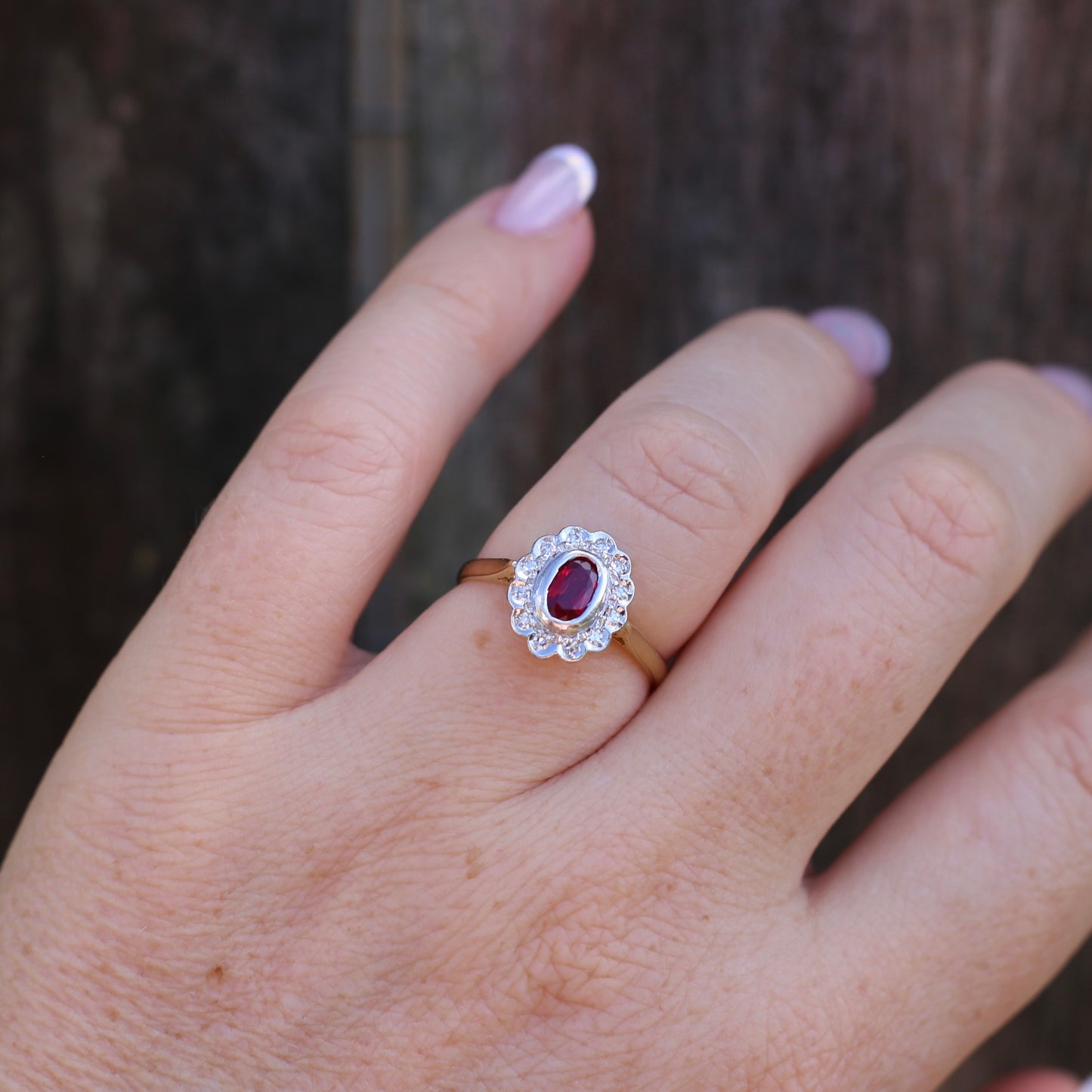 Ruby and Diamond Halo, 18ct Yellow and White Gold, size P or 7.75 with valuation