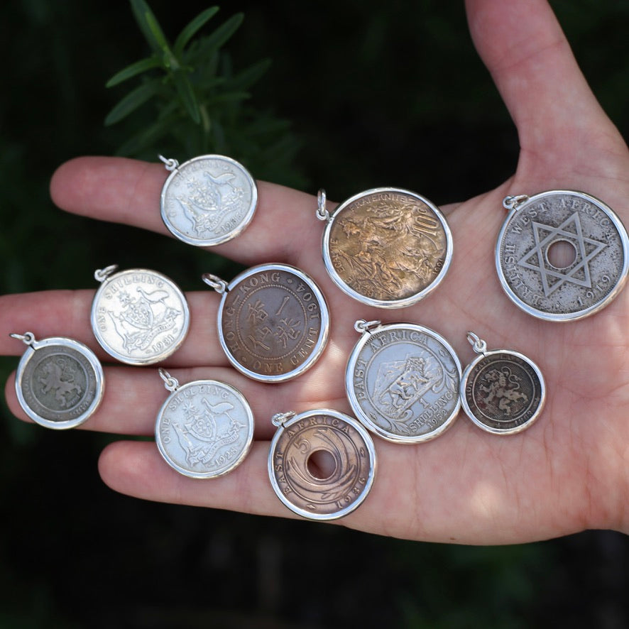 Global Coins in Silver Bezel Frames