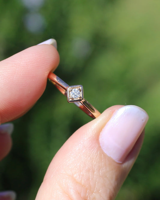 Vintage Diamond Solitaire 0.06ct Brilliant Cut Diamond in 9ct Rose Gold Ring, size O or just over 7, 2.00g