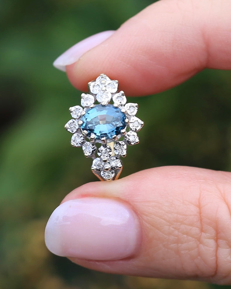 1989 Blue Zircon and Diamond Halo Ring, 9ct Yellow and White Gold, size N1/2 or 7, 3.18g