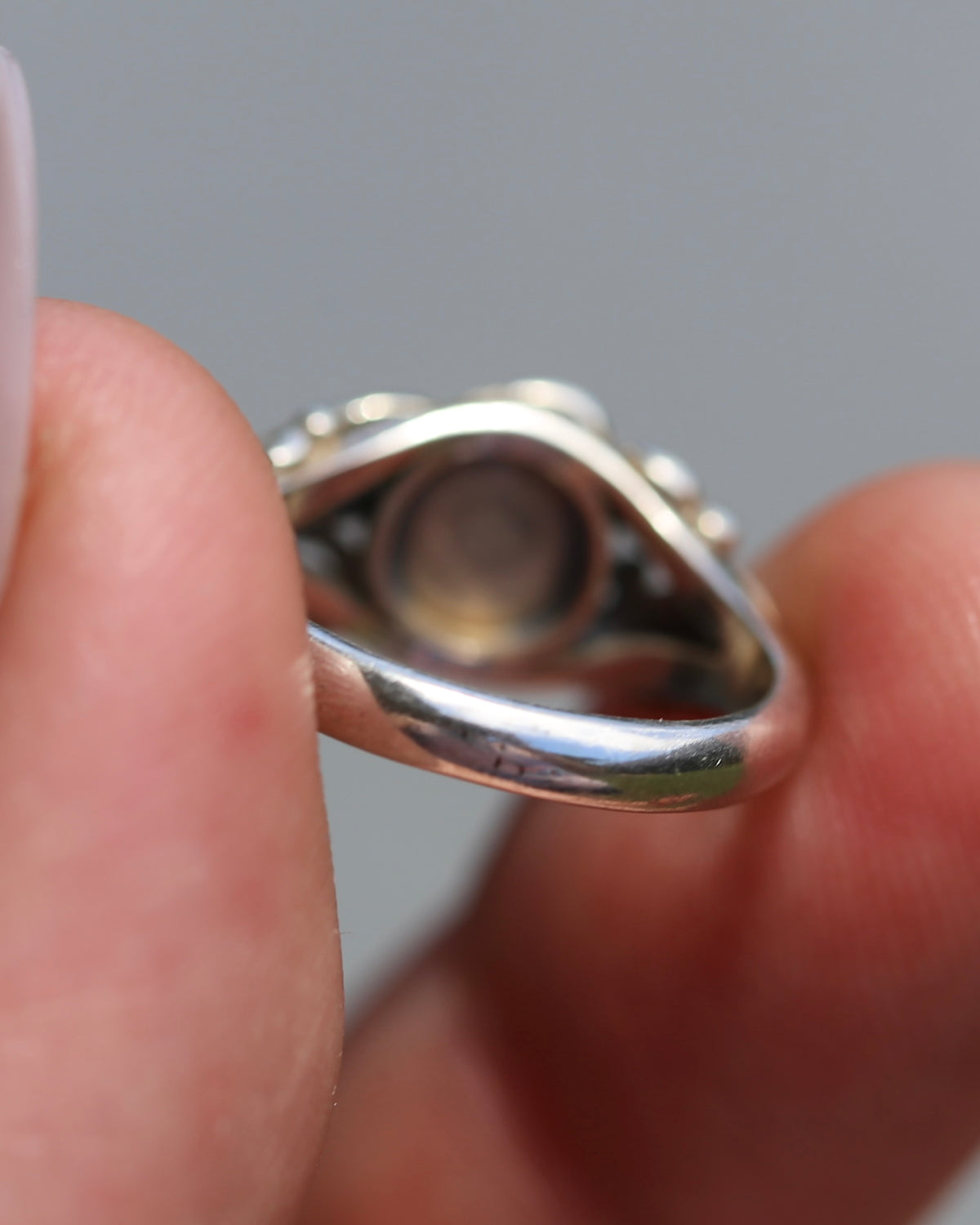 Amethyst Cabochon in Bezel Setting and Leaf & Swirl Surrounds, Sterling Silver, size J1/2 or 5, 3.38g