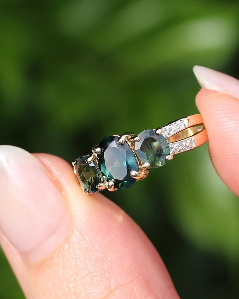 2.49ct Australian Green and Parti Sapphire Trilogy with diamond side stones, 10ct Yellow Gold, size 7 or just over N1/2, 3.38g