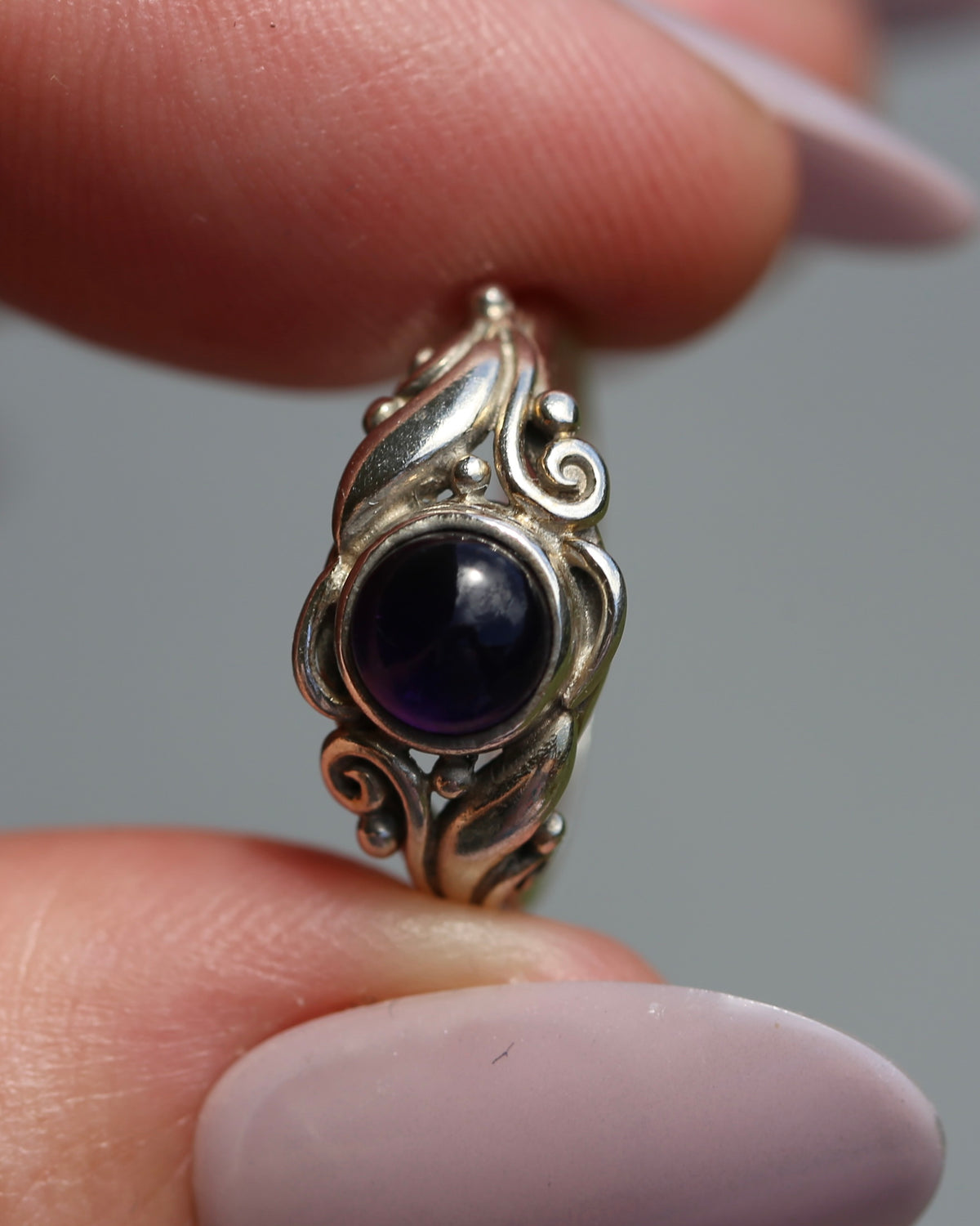 Amethyst Cabochon in Bezel Setting and Leaf & Swirl Surrounds, Sterling Silver, size J1/2 or 5, 3.38g