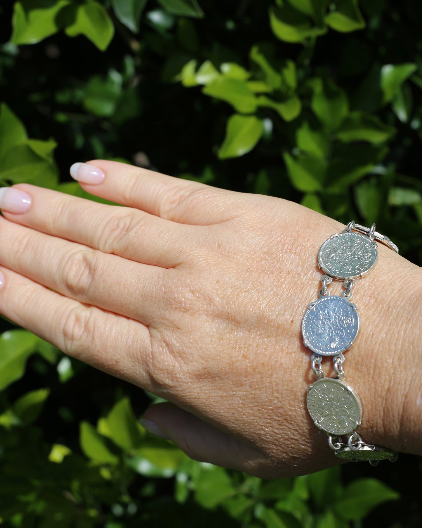 1960 - 1966 Sixpence Bracelet - set in 4 claw settings with double links, 20cm or 8 inches