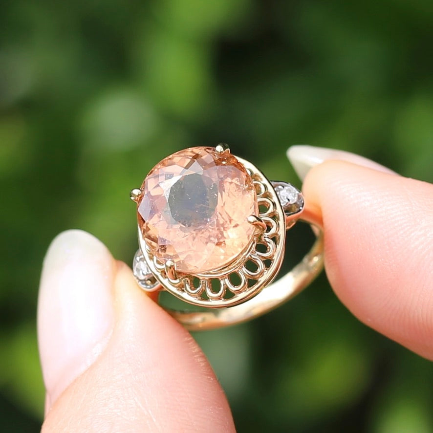 Oval Peach Tourmaline Ring with Pierced Wire Surrounds and Diamonds in the Shoulders, 9ct Yellow Gold, size N or 6.75