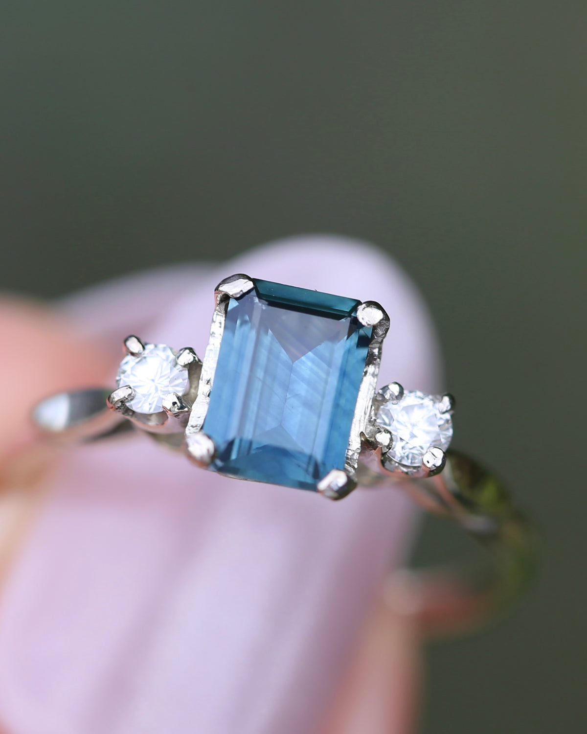 1.1ct Emerald Cut Natural Blue Teal Sapphire and Diamond Trilogy, 18ct White Gold and Platinum, size O or just over 7, 2.27g