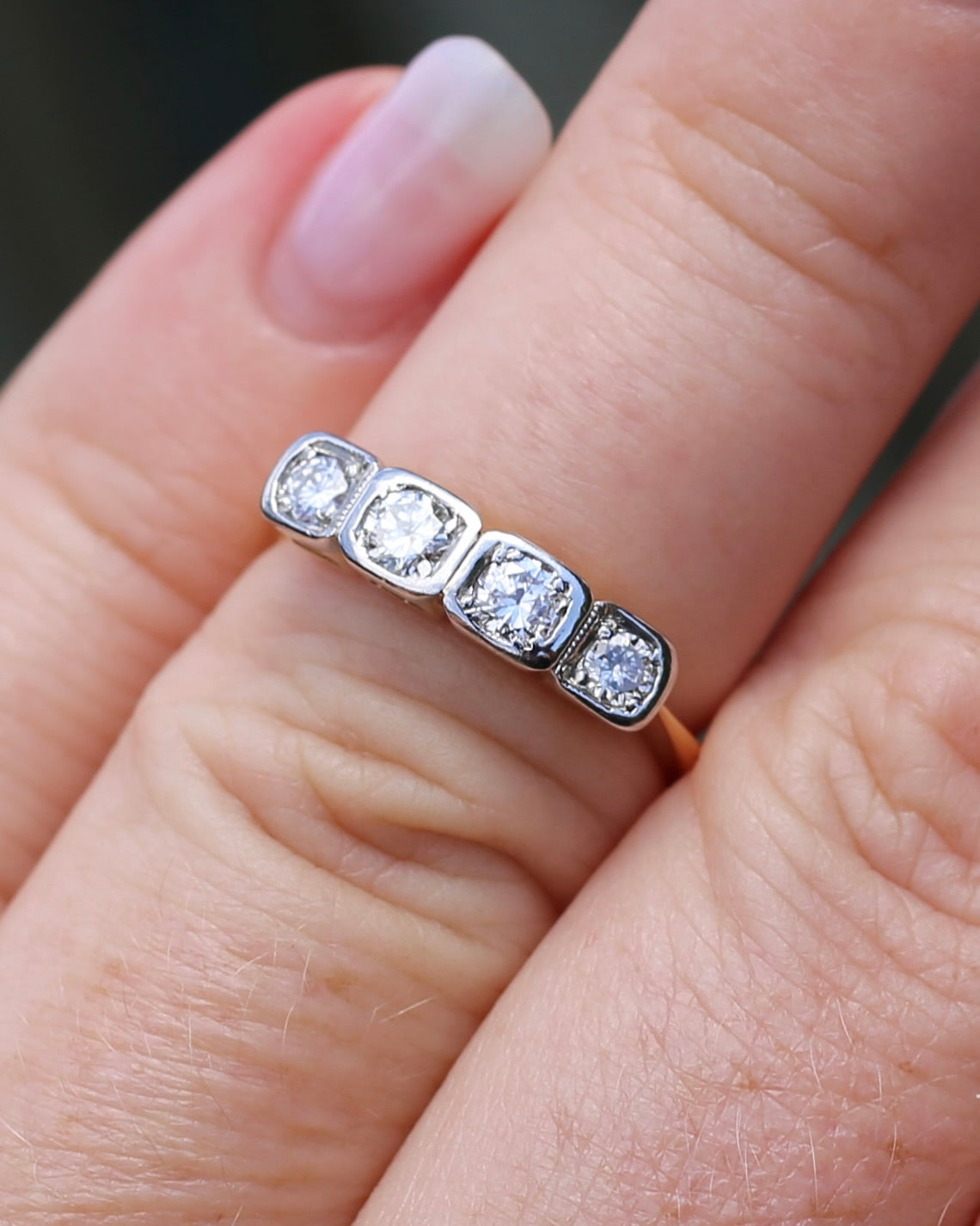 Circa 1930s Four Stone "Quadrillo" Diamond Ring, 18ct Yellow Gold and Paladium, size just over K1/2 or just over 5.5, 3.04g, with valuation