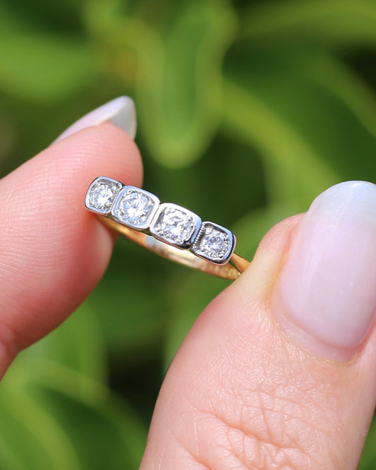 Circa 1930s Four Stone "Quadrillo" Diamond Ring, 18ct Yellow Gold and Paladium, size just over K1/2 or just over 5.5, 3.04g, with valuation