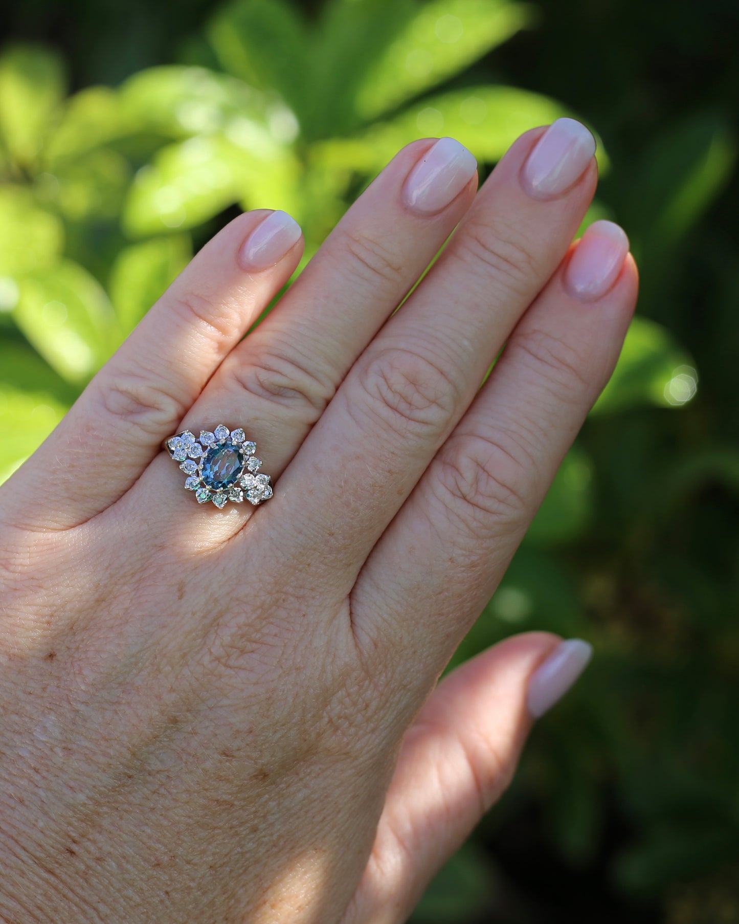 1989 Blue Zircon and Diamond Halo Ring, 9ct Yellow and White Gold, size N1/2 or 7, 3.18g