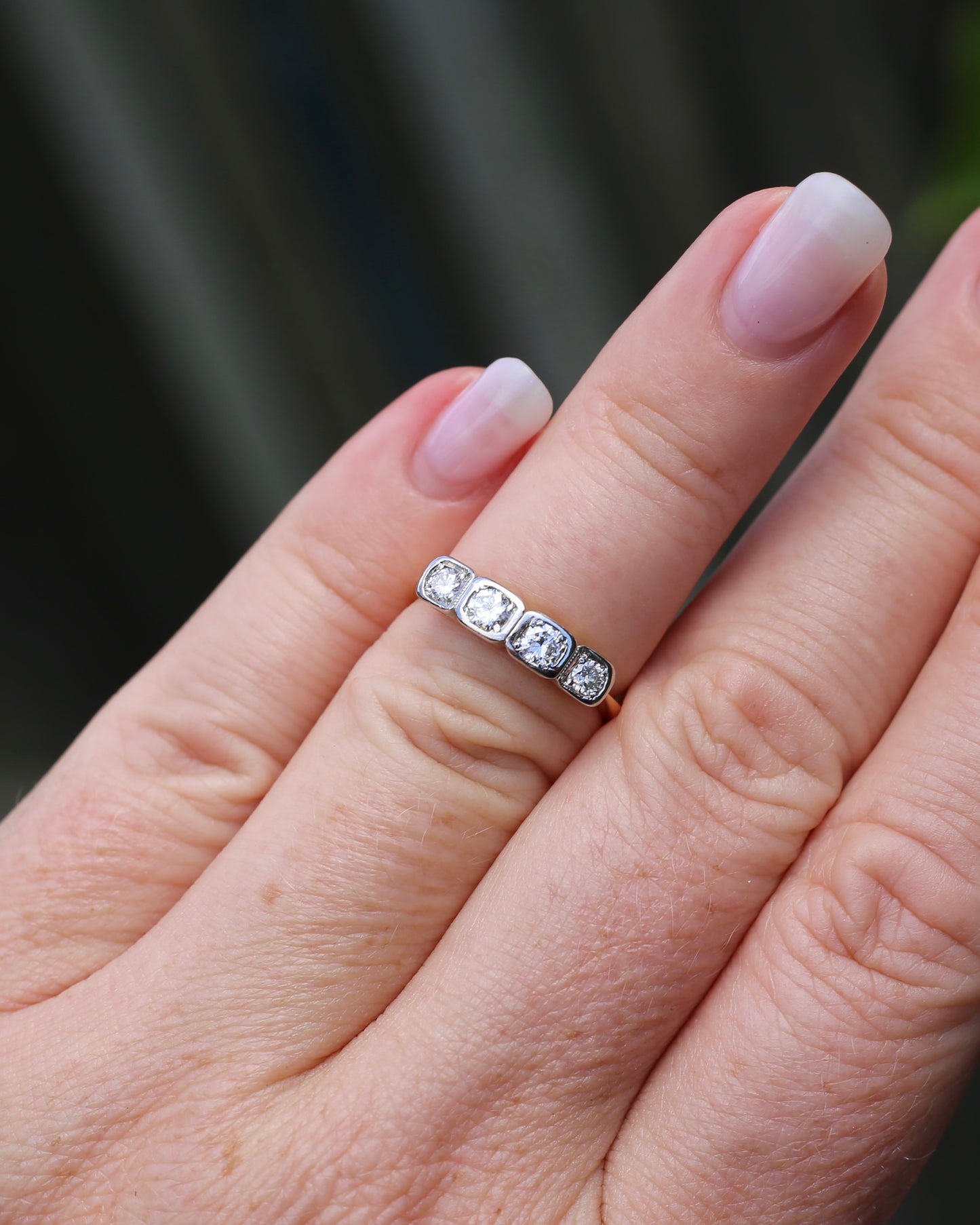 Circa 1930s Four Stone "Quadrillo" Diamond Ring, 18ct Yellow Gold and Paladium, size just over K1/2 or just over 5.5, 3.04g, with valuation