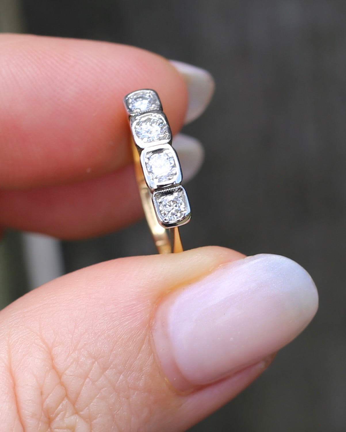 Circa 1930s Four Stone "Quadrillo" Diamond Ring, 18ct Yellow Gold and Paladium, size just over K1/2 or just over 5.5, 3.04g, with valuation