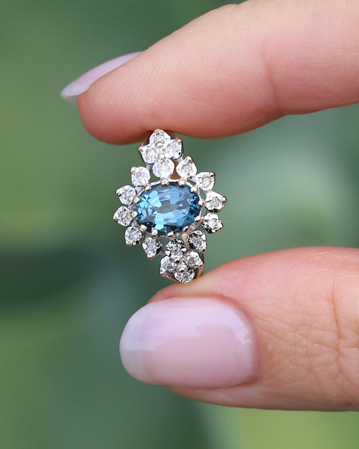 1989 Blue Zircon and Diamond Halo Ring, 9ct Yellow and White Gold, size N1/2 or 7, 3.18g