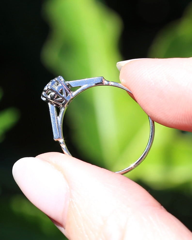 0.22ct old cut diamond solitaire, Platinum and Pale 18ct Gold, size P1/2