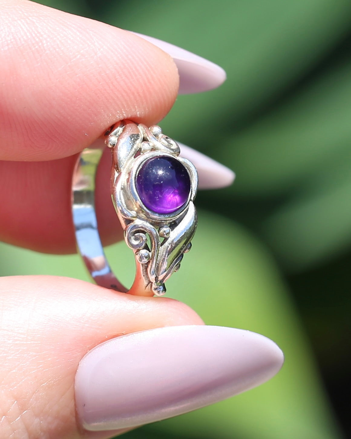 Amethyst Cabochon in Bezel Setting and Leaf & Swirl Surrounds, Sterling Silver, size J1/2 or 5, 3.38g