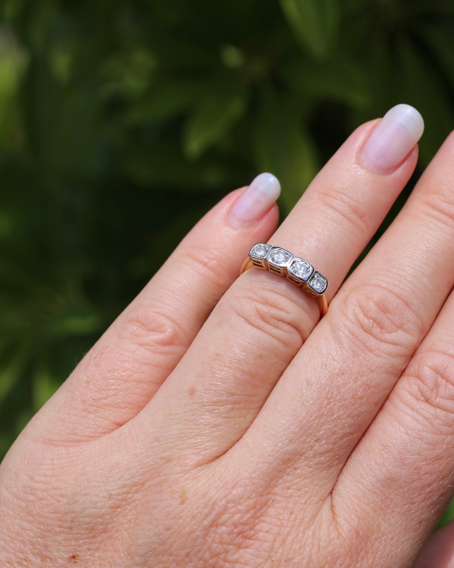 Circa 1930s Four Stone "Quadrillo" Diamond Ring, 18ct Yellow Gold and Paladium, size just over K1/2 or just over 5.5, 3.04g, with valuation