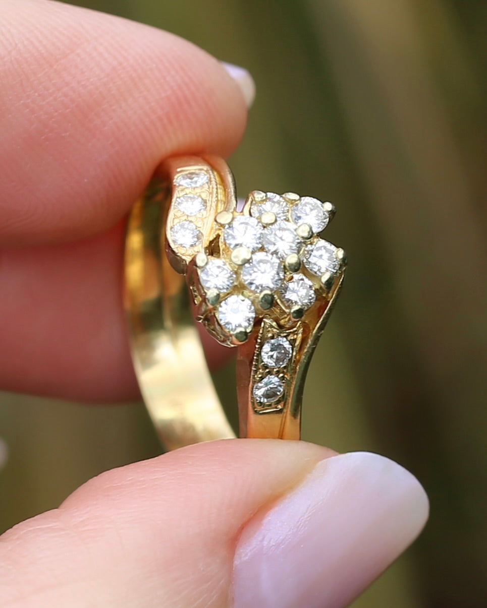 Circa 1970s Transitonal Brilliant Cut Diamond Ring, 18ct Yellow Gold Cluster Ring, size S or 9, 6.4g, with valuation