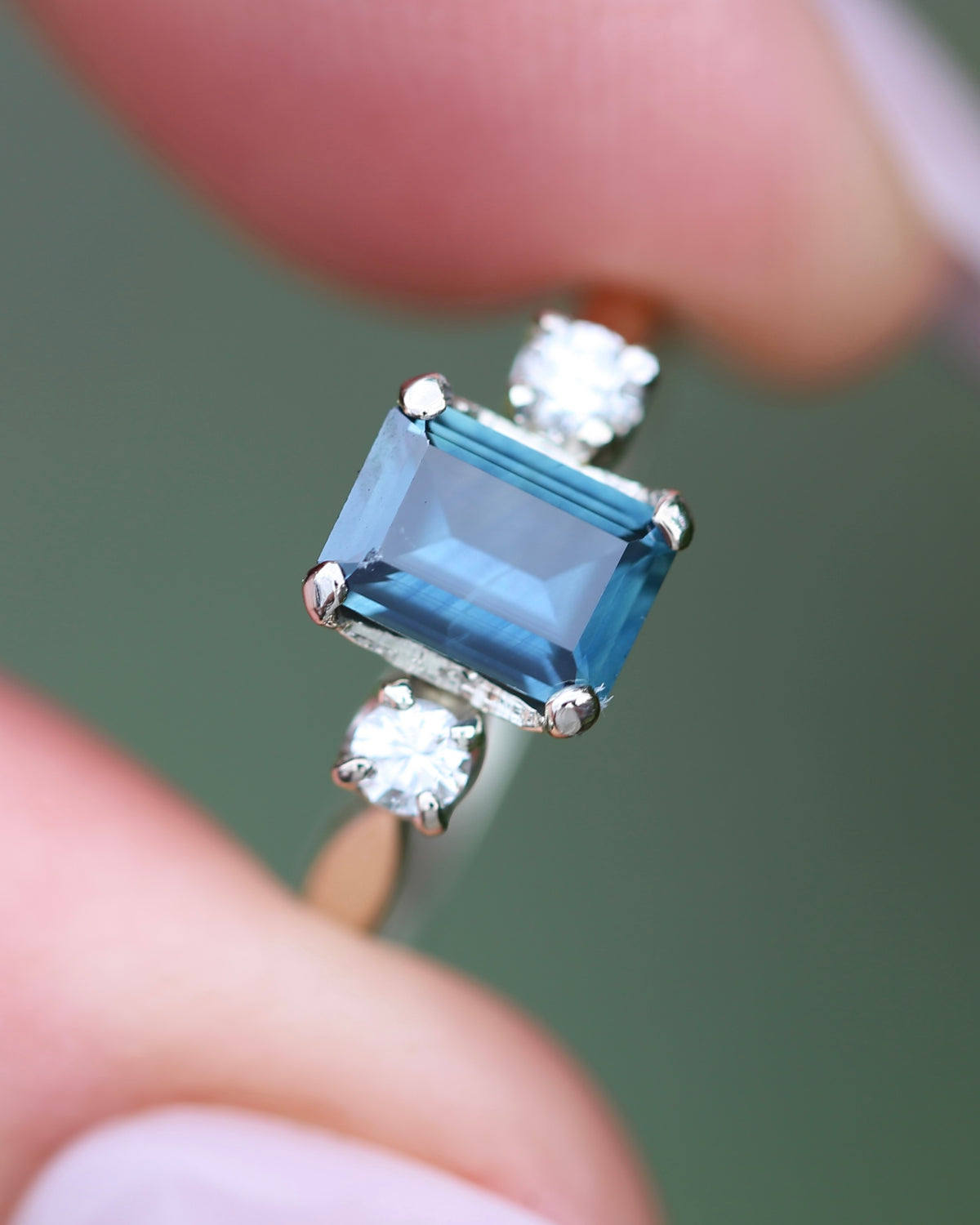 1.1ct Emerald Cut Natural Blue Teal Sapphire and Diamond Trilogy, 18ct White Gold and Platinum, size O or just over 7, 2.27g