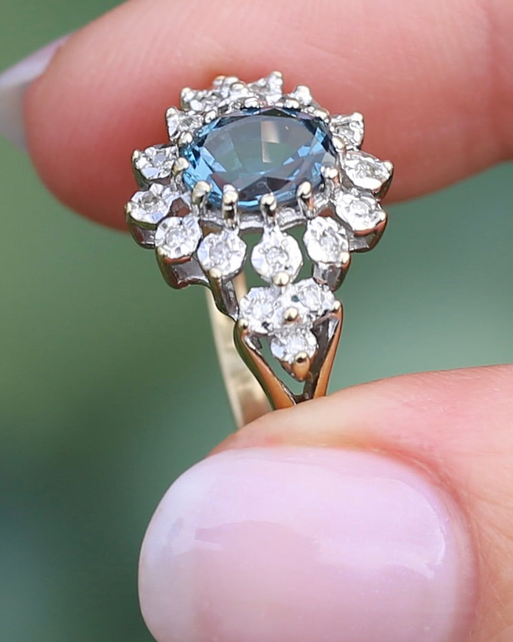 1989 Blue Zircon and Diamond Halo Ring, 9ct Yellow and White Gold, size N1/2 or 7, 3.18g