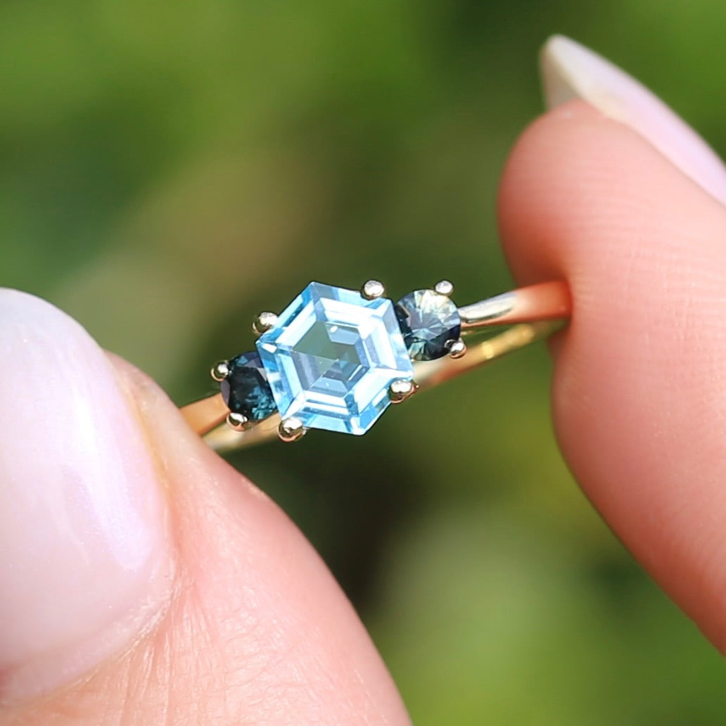 Hexagonal Blue Topaz and Parti Sapphire Trilogy, 9ct Yellow Gold, size O or 7.25