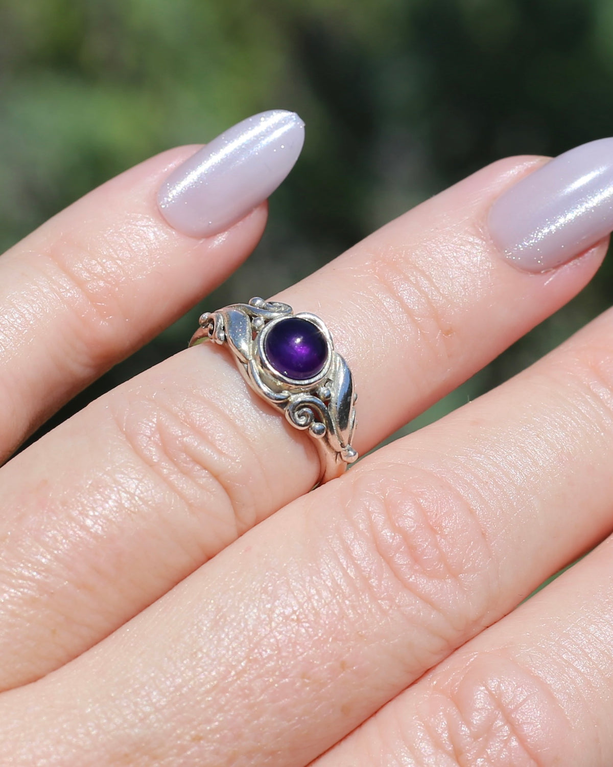 Amethyst Cabochon in Bezel Setting and Leaf & Swirl Surrounds, Sterling Silver, size J1/2 or 5, 3.38g