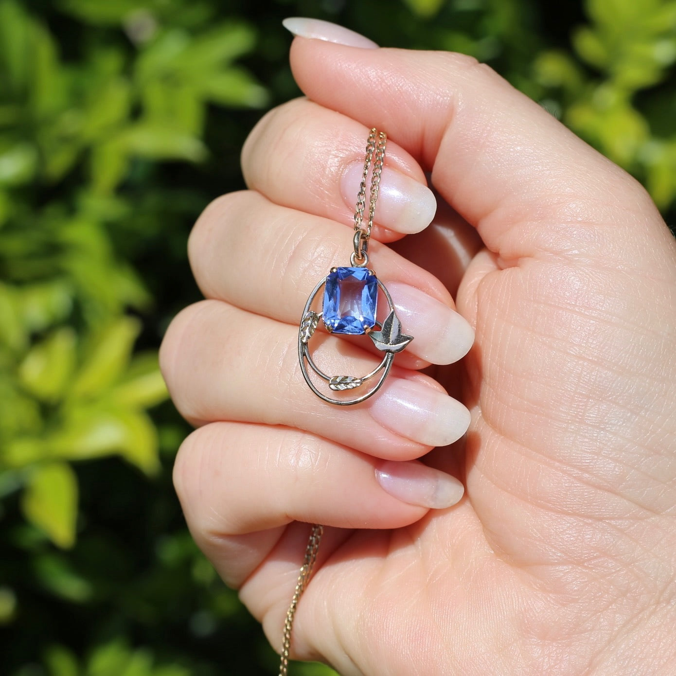 1930s -1950s Arts & Crafts Blue Paste Pendant in Decorative 9ct Gold Leaf Surround, 1.75g