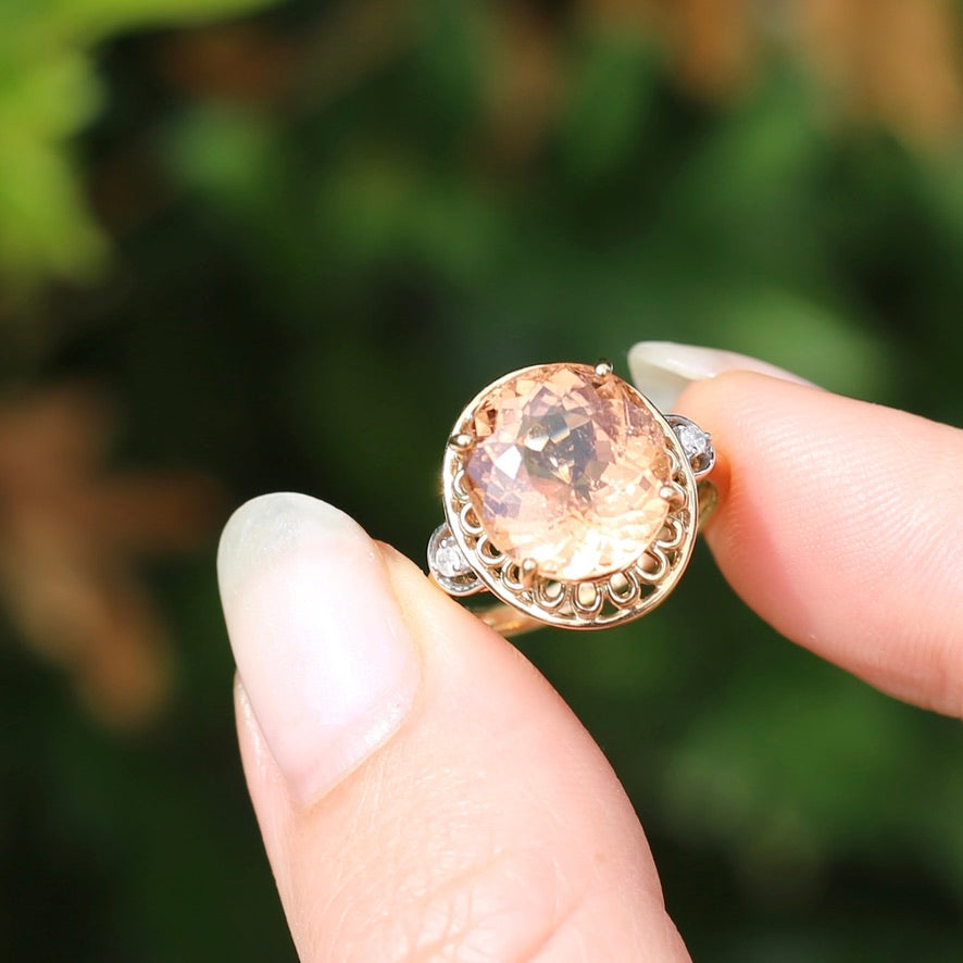 Oval Peach Tourmaline Ring with Pierced Wire Surrounds and Diamonds in the Shoulders, 9ct Yellow Gold, size N or 6.75