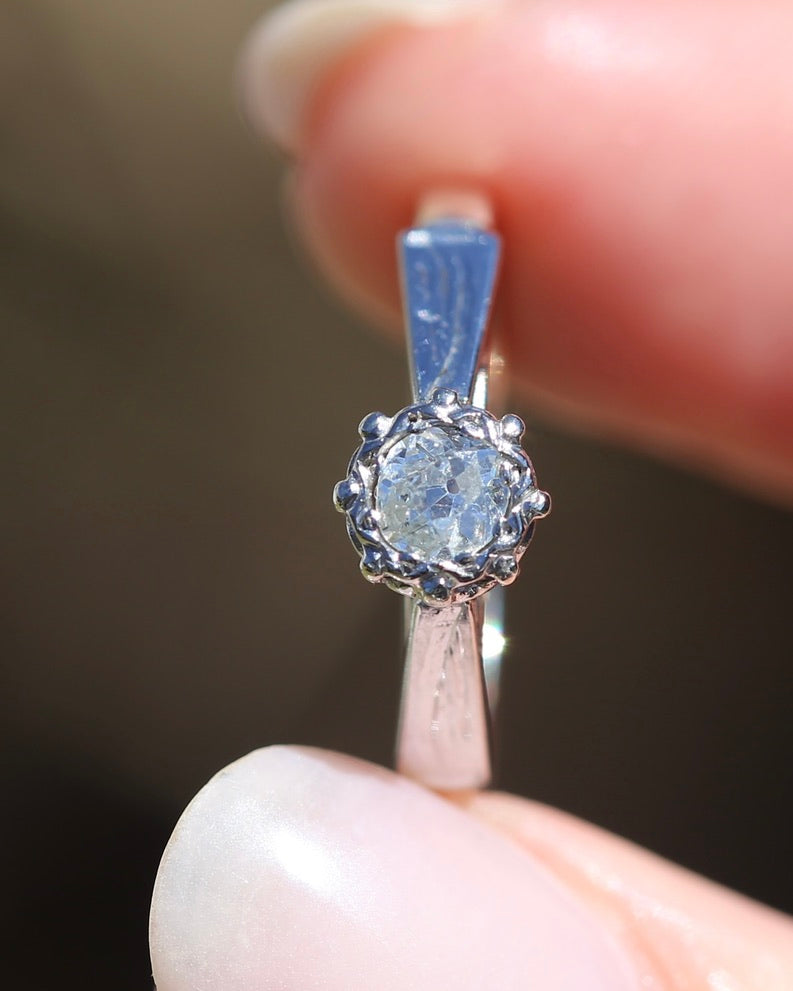 0.22ct old cut diamond solitaire, Platinum and Pale 18ct Gold, size P1/2