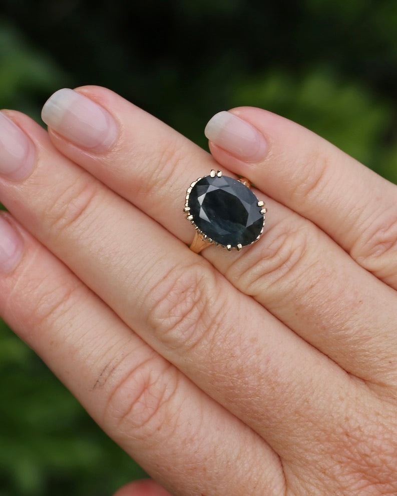 8.4ct Opaque Blue Sapphire, in Four Double Claw Filigree 9ct Yellow Gold Ring, size J or 4.75, 3.53g