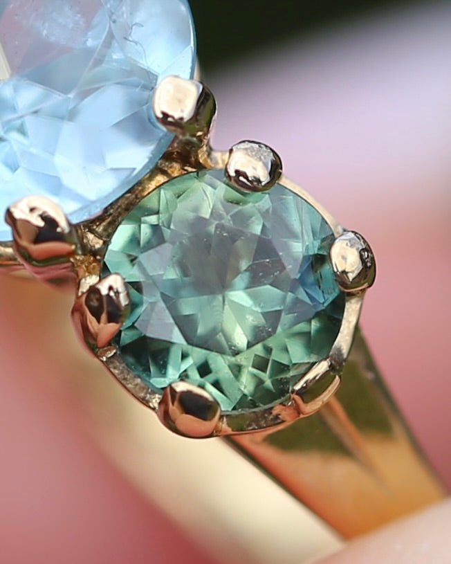 1.65ct Blue Zircon and 0.97ct Parti Sapphire Trilogy, 9ct Yellow Gold, size R1/2 or 8.75