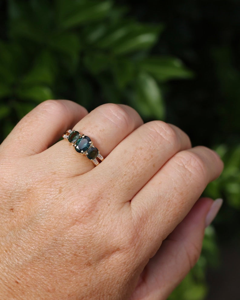 2.49ct Australian Green and Parti Sapphire Trilogy with diamond side stones, 10ct Yellow Gold, size 7 or just over N1/2, 3.38g