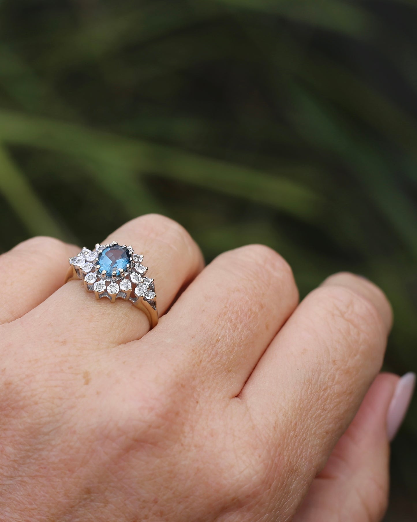1989 Blue Zircon and Diamond Halo Ring, 9ct Yellow and White Gold, size N1/2 or 7, 3.18g