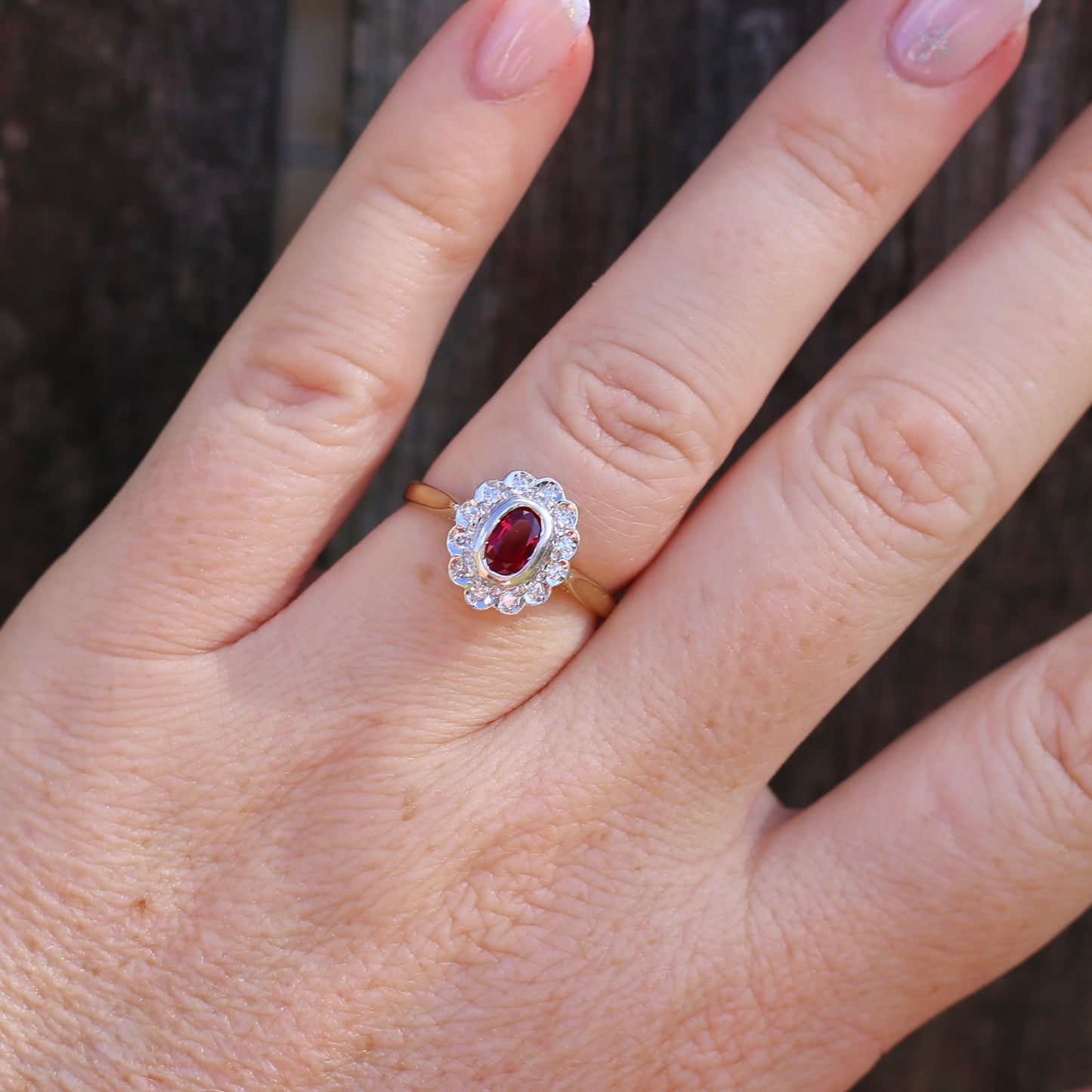 Ruby and Diamond Halo, 18ct Yellow and White Gold, size P or 7.75 with valuation