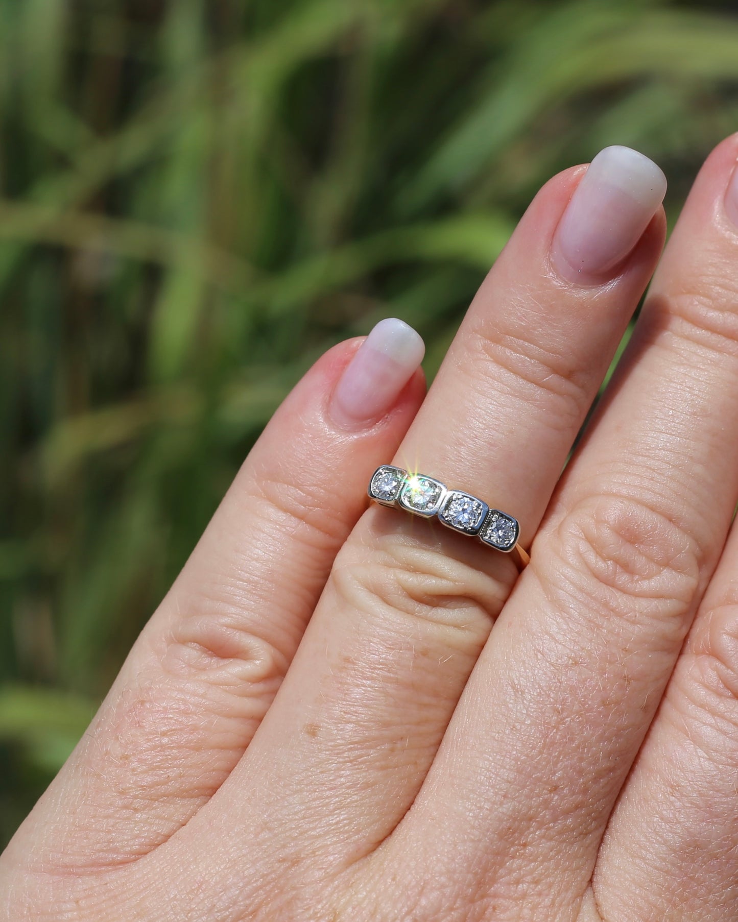 Circa 1930s Four Stone "Quadrillo" Diamond Ring, 18ct Yellow Gold and Paladium, size just over K1/2 or just over 5.5, 3.04g, with valuation