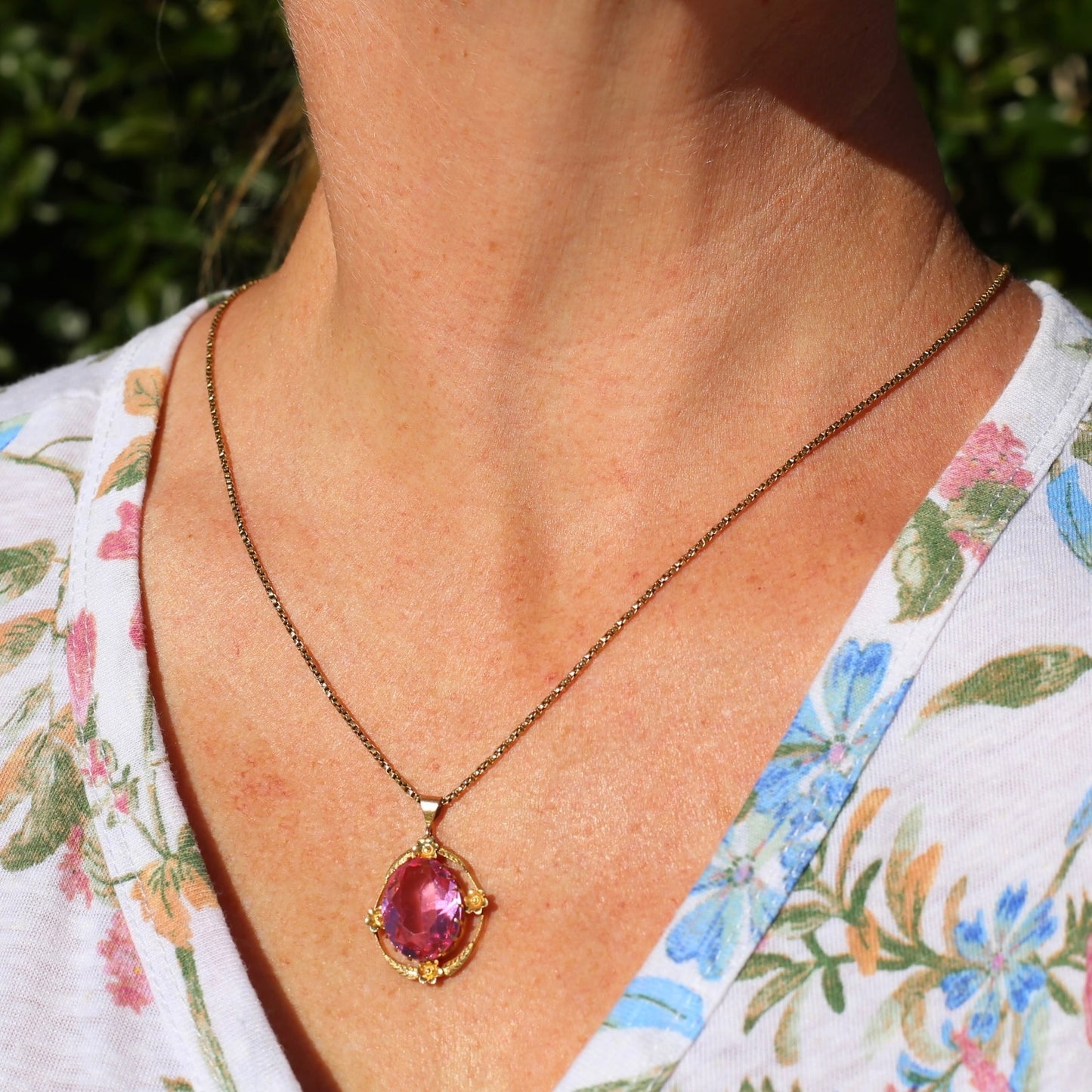 Circa 1930s-1950s Pink Paste Pendant in Decorative 9ct Gold Floral Surround, 4.23g