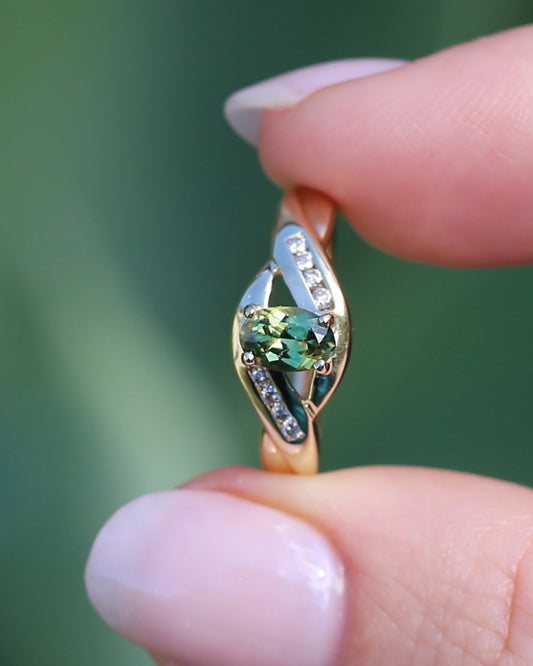 0.65 Green Yellow Australian Parti Sapphire with 8 Channel Set Diamond Side Stones, 9ct Yellow Gold, size M1/2 or 6.5, 2.17g