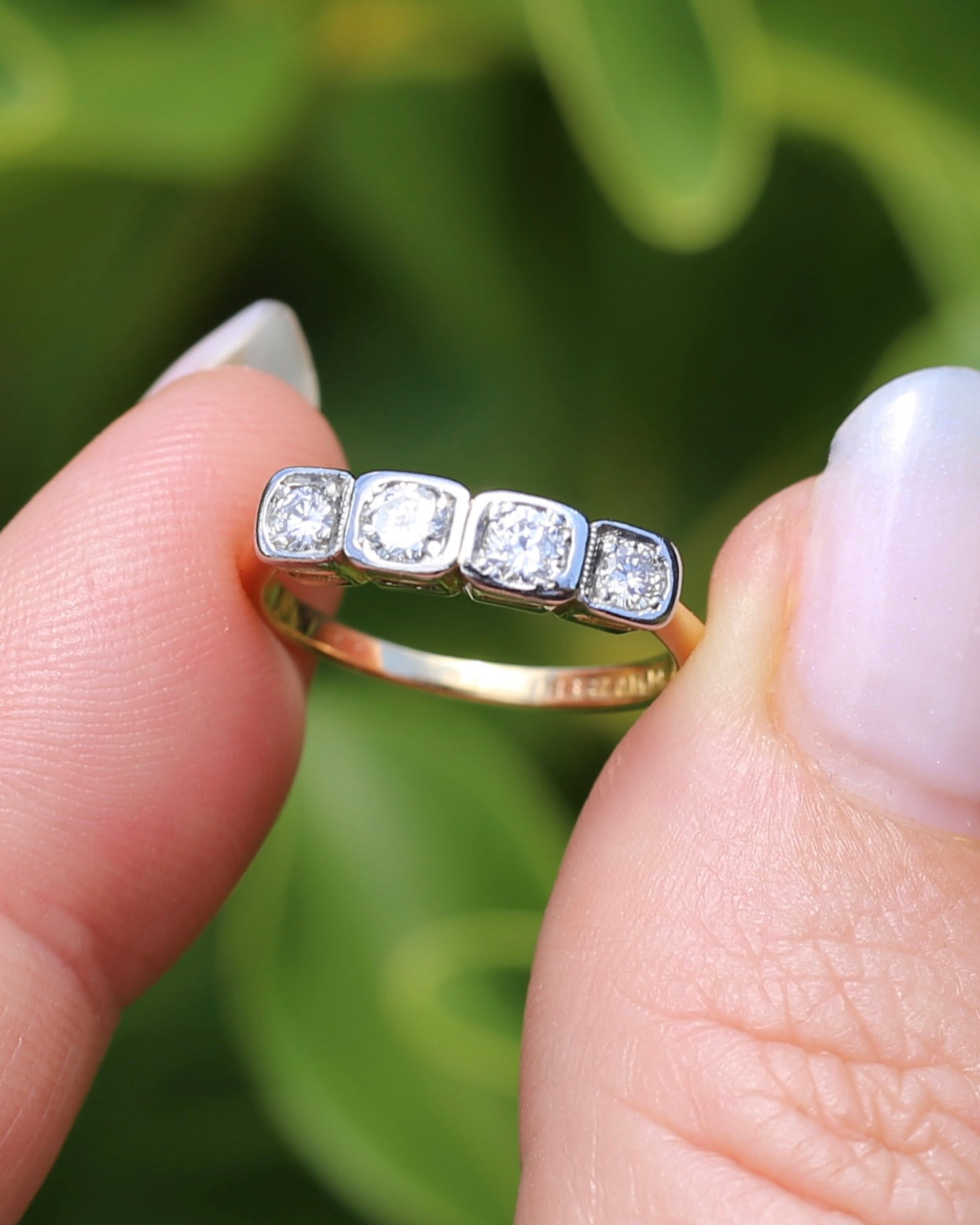 Circa 1930s Four Stone "Quadrillo" Diamond Ring, 18ct Yellow Gold and Paladium, size just over K1/2 or just over 5.5, 3.04g, with valuation