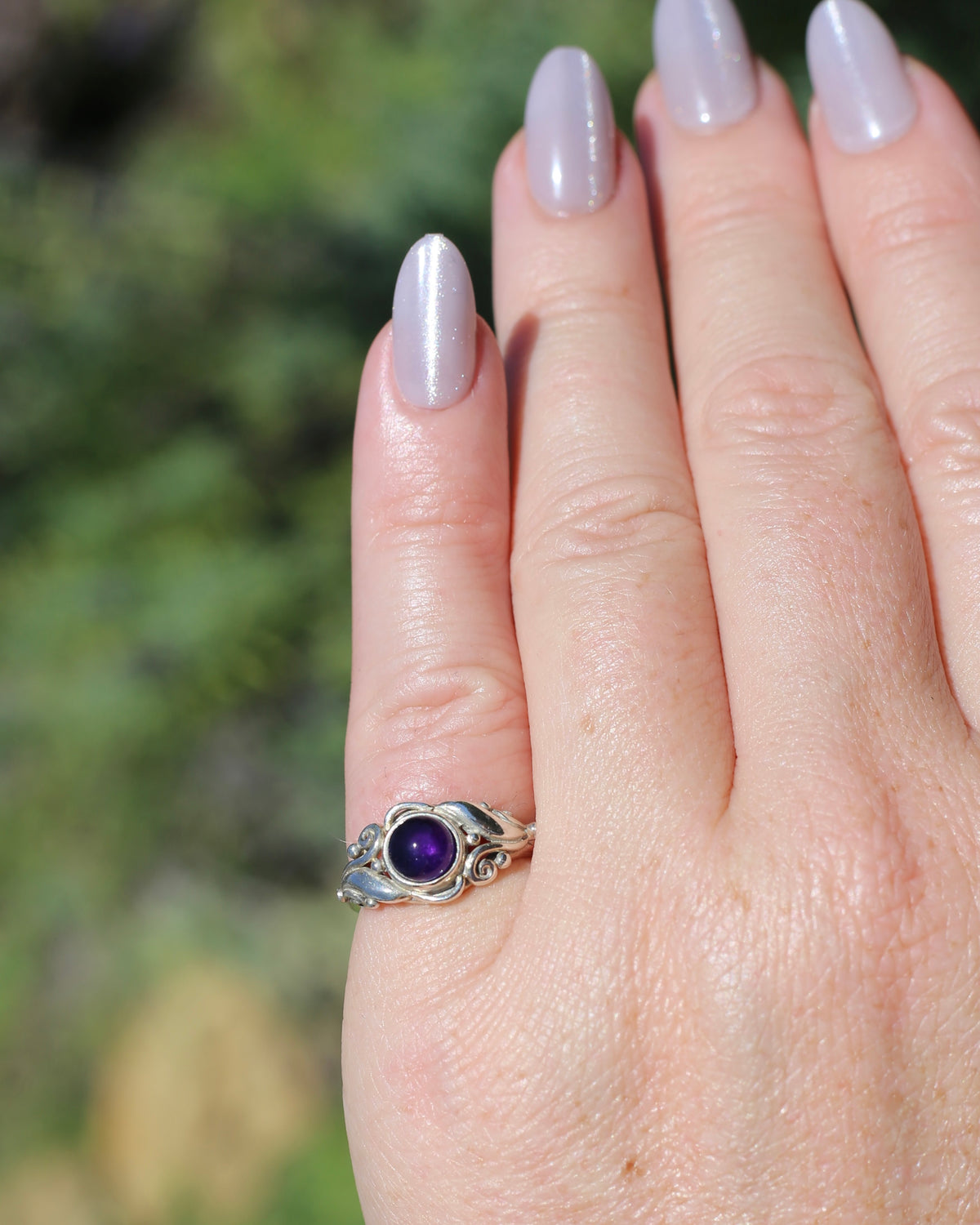 Amethyst Cabochon in Bezel Setting and Leaf & Swirl Surrounds, Sterling Silver, size J1/2 or 5, 3.38g