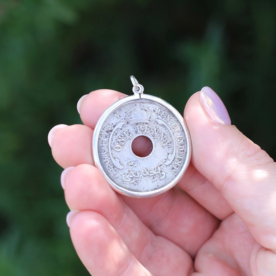 Global Coins in Silver Bezel Frames