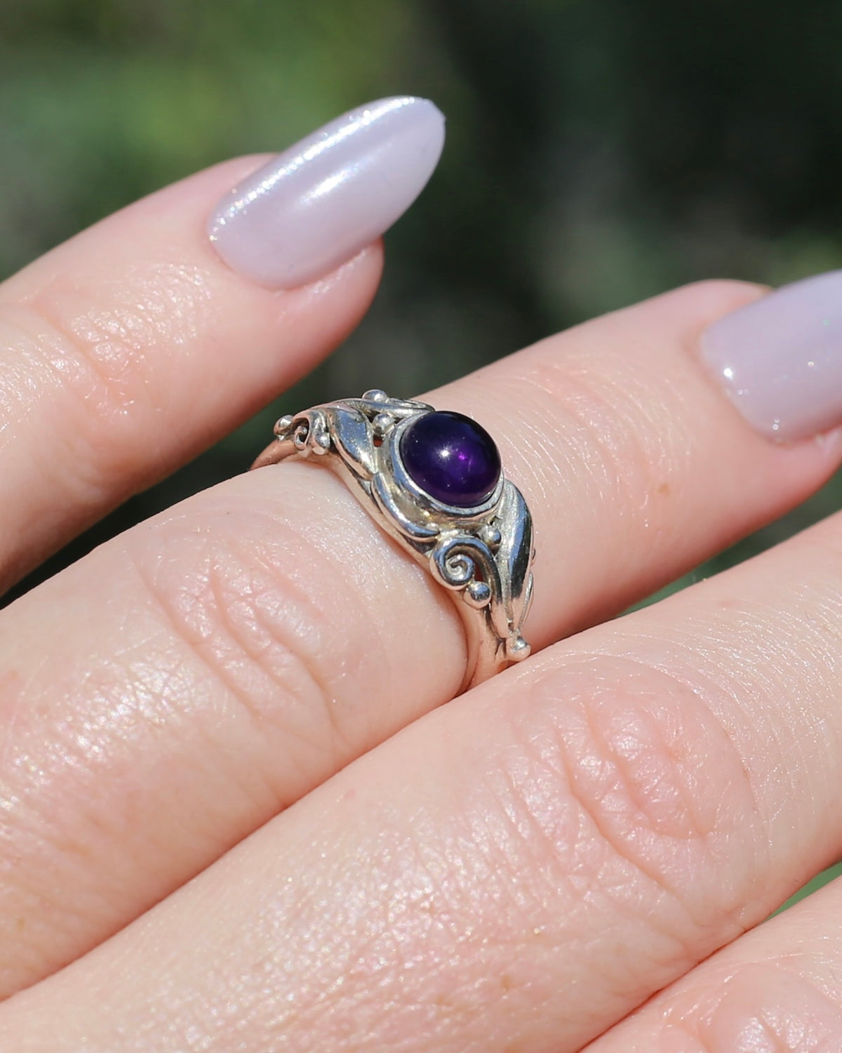 Amethyst Cabochon in Bezel Setting and Leaf & Swirl Surrounds, Sterling Silver, size J1/2 or 5, 3.38g