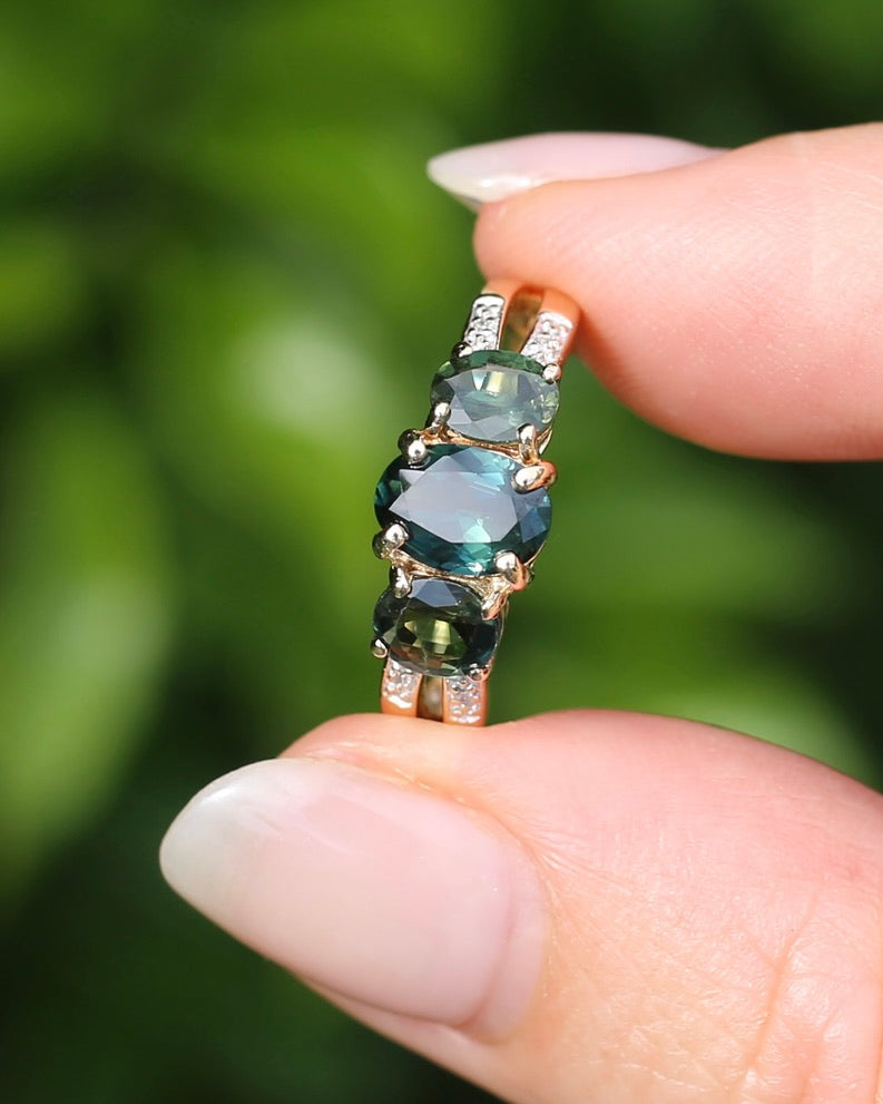 2.49ct Australian Green and Parti Sapphire Trilogy with diamond side stones, 10ct Yellow Gold, size 7 or just over N1/2, 3.38g