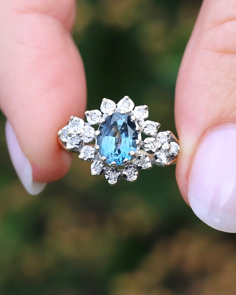 1989 Blue Zircon and Diamond Halo Ring, 9ct Yellow and White Gold, size N1/2 or 7, 3.18g