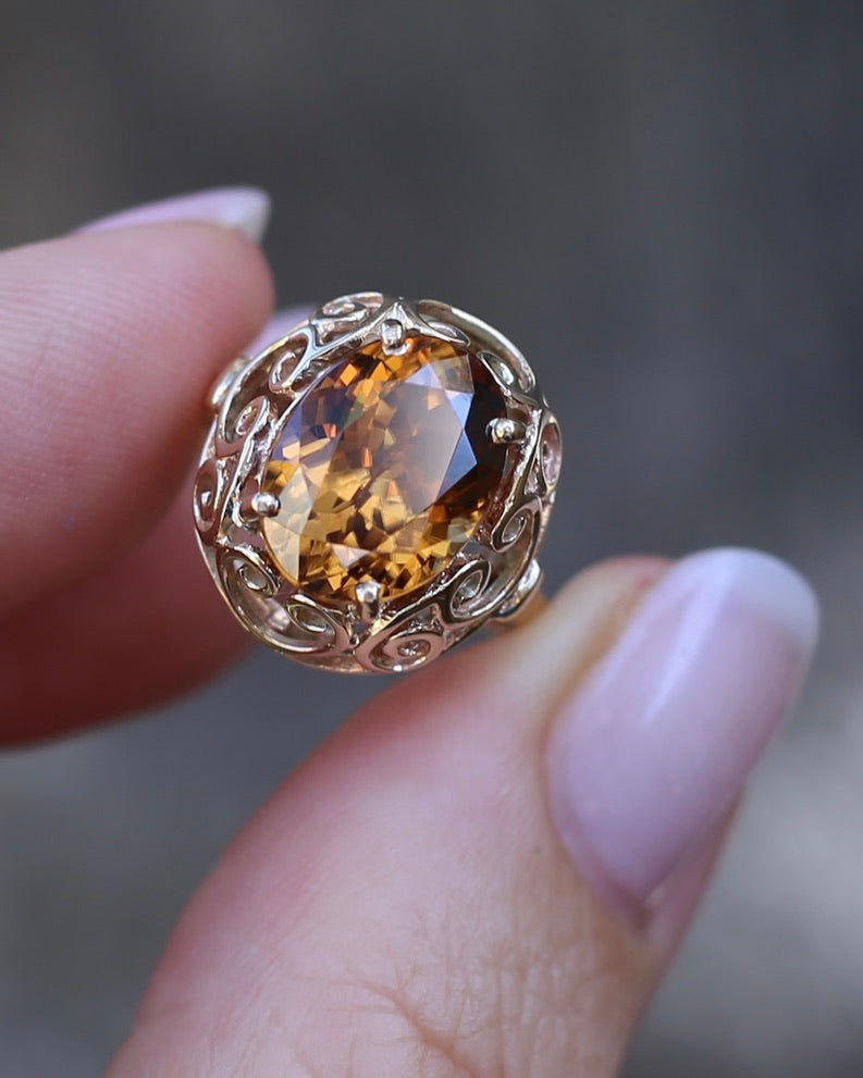 6.9ct Oval Natural Zircon in Raised Filigree Setting, 10ct Yellow Gold, size M1/2 or 6.5, 4.83g