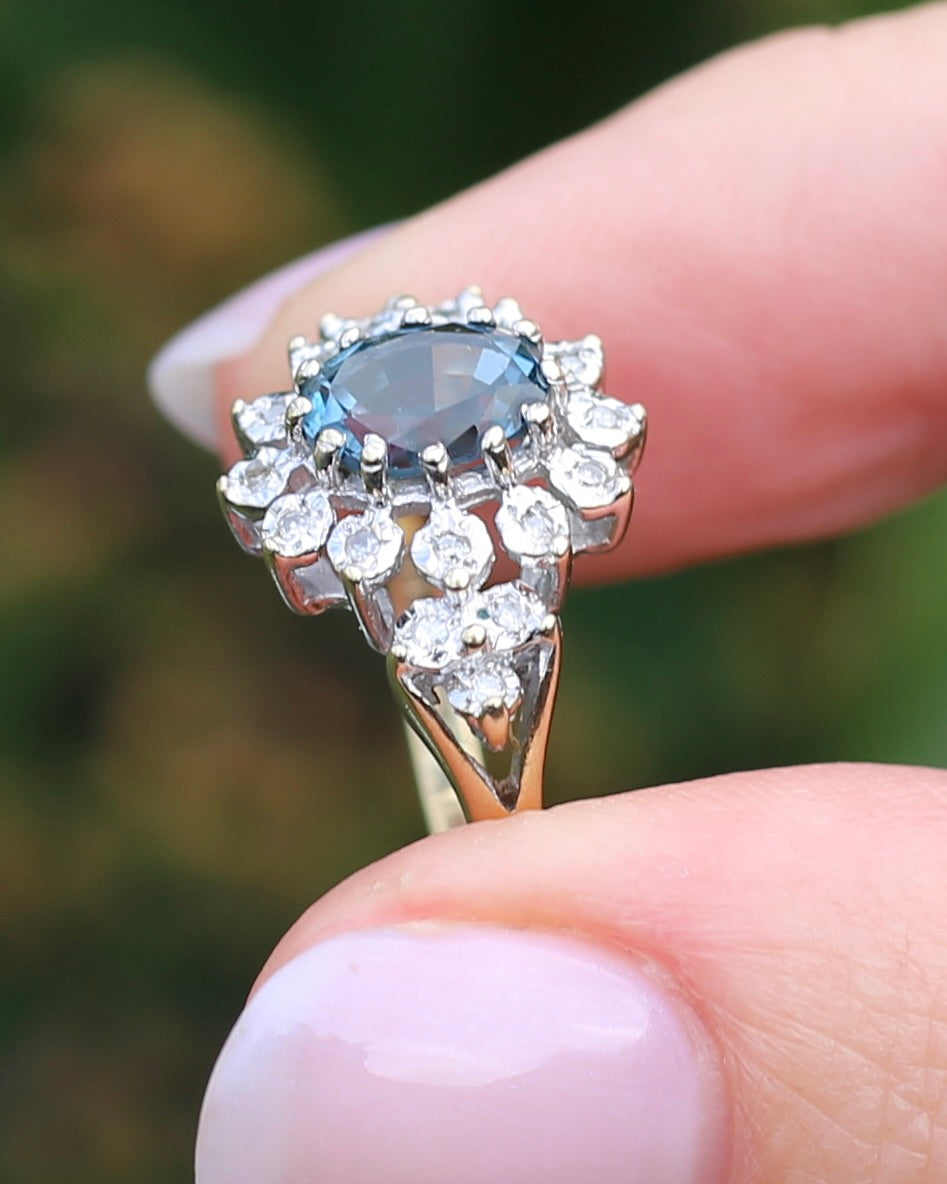 1989 Blue Zircon and Diamond Halo Ring, 9ct Yellow and White Gold, size N1/2 or 7, 3.18g