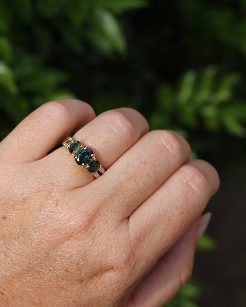 2.49ct Australian Green and Parti Sapphire Trilogy with diamond side stones, 10ct Yellow Gold, size 7 or just over N1/2, 3.38g