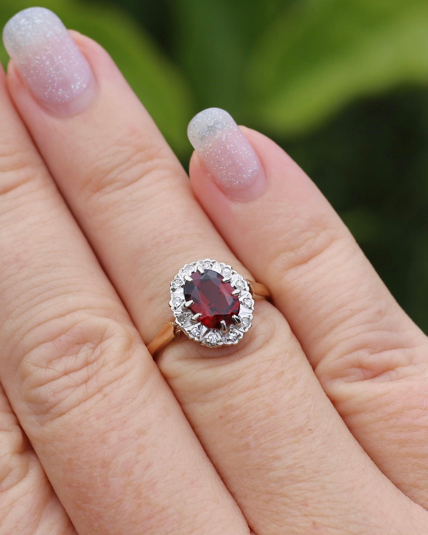 1974 Made Garnet and Diamond Halo Ring, 9ct Yellow and White Gold, size M1/2 or 6.5, 2.83g