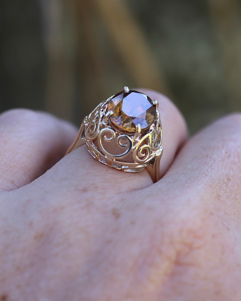 6.9ct Oval Natural Zircon in Raised Filigree Setting, 10ct Yellow Gold, size M1/2 or 6.5, 4.83g
